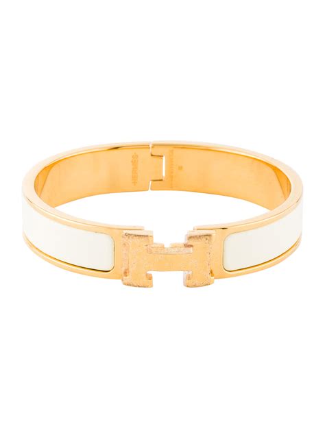 hermes solid gold cuff